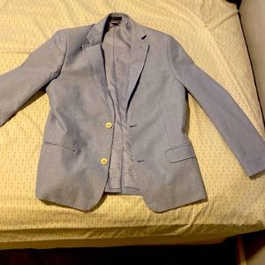 This is a Tommy Hilfiger size 16 suit jacket and it is grey-ish blue
